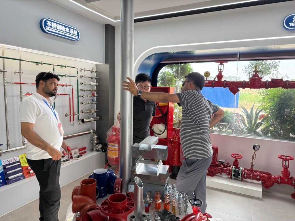 Foreign customers visiting Canhope Steel showroom — galvanized pipe and steel wholesale supplier in China