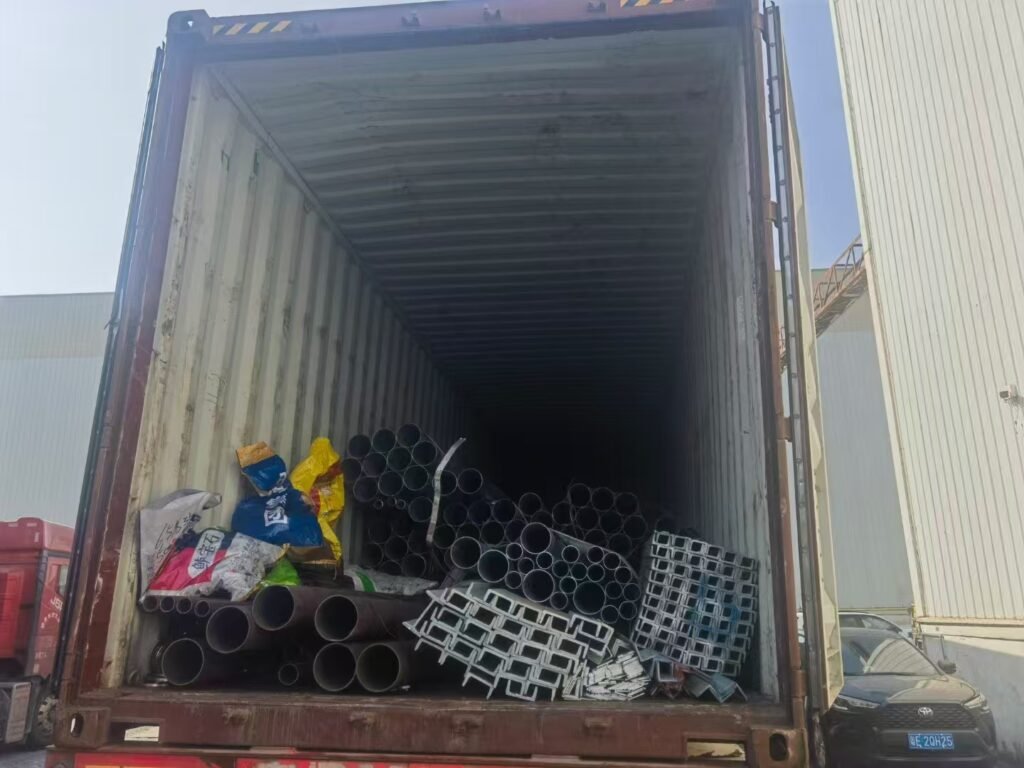 mixed steel products including pipes beams and sheets in one container