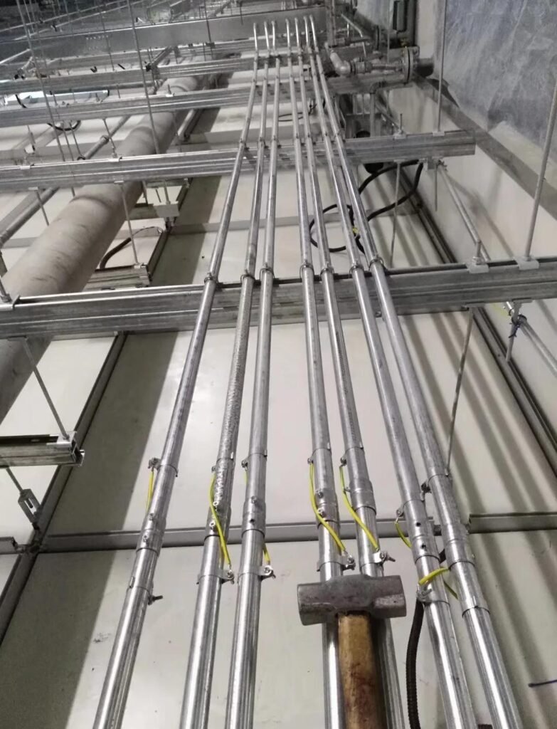 Galvanized steel conduit installation for commercial electrical wiring system using GI conduit pipes and conduit fittings