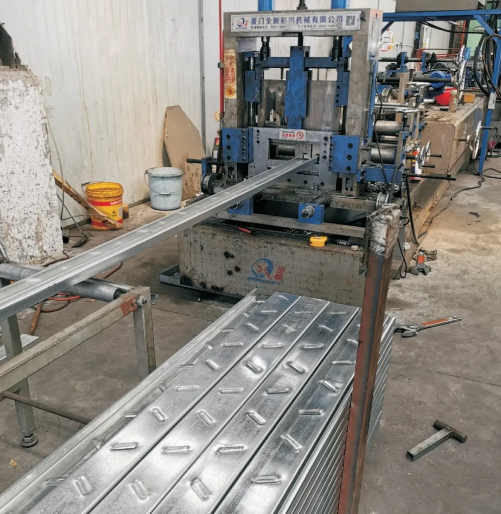 Roll forming line producing punched galvanized C purlins at the CanHope Steel processing plant